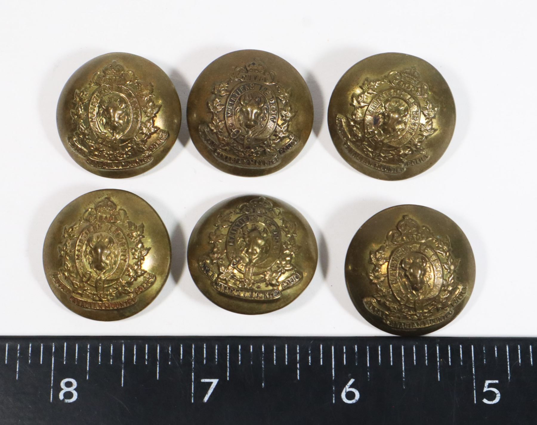 #403 WW2 ROYAL CANADIAN MOUNTED POLICE BUTTONS