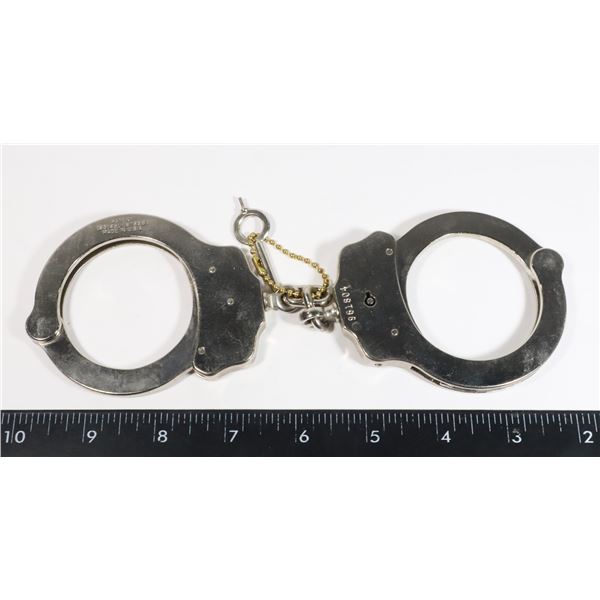 #405  VINTAGE PEERLESS HANDCUFFS  MADE IN USA