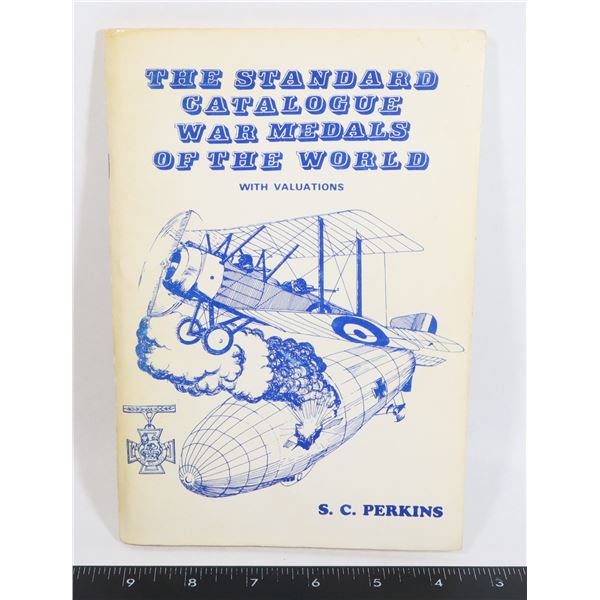 #409 MEDAL REFFERENCE BOOK WORN CONDITION