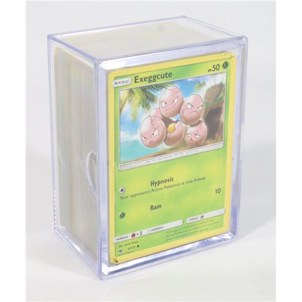 #744  POKÉMON CARD LOT IN PLASTIC CASE