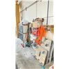 Image 1 : CONTENTS OF STORAGE WALL INCLUDING: CHROME 4 TIER RACK WITH JERRY CANS, 4 WHEEL MOBILE CARTS,
