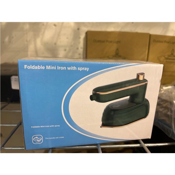Foldable and portable clothing iron with spray function