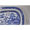 Image 2 : Large unmarked antique ironstone charger with decorative blue and white Willow pattern, 16" X 20"