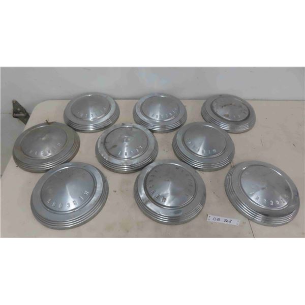 9 Mercury Hubcaps