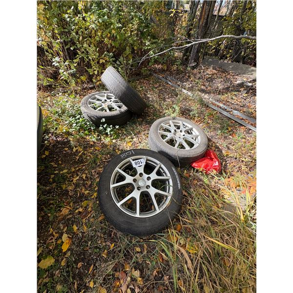 4 dodge Rims c/w 225/55 R19" tires.