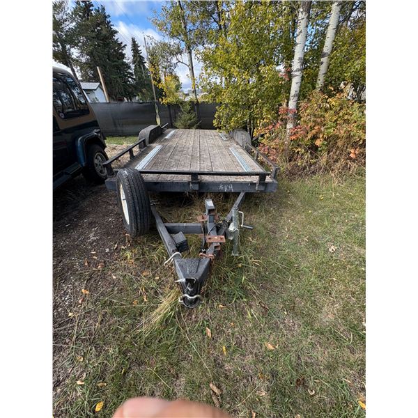 2011 16' Tandem flat deck trailer c/w ramps & spare. Approx 3000 lb axles. # 4UGFC1624BD018629