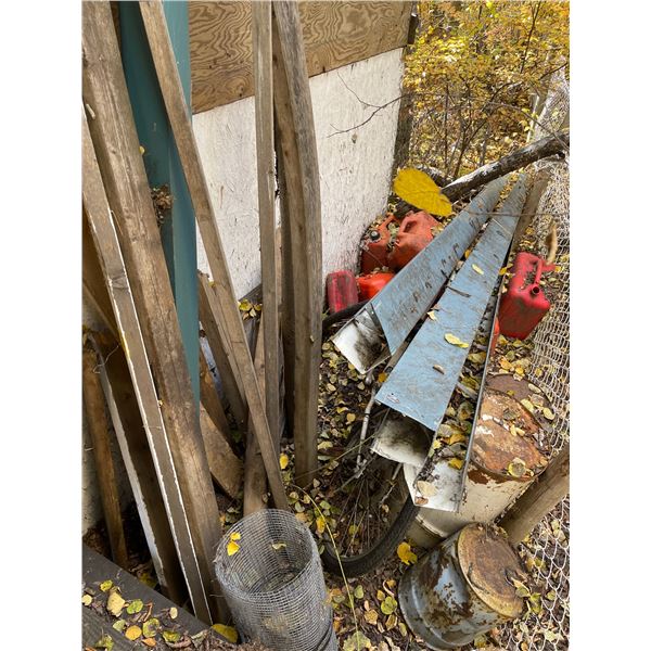 Qty of tin, lumber, jerry cans, bike, barrels