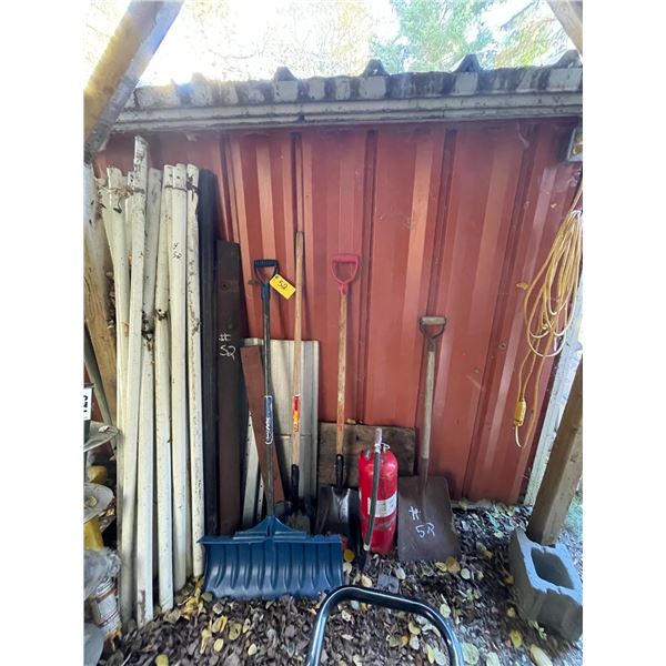 Tent poles, shovels, metal plate, fire extinguisher