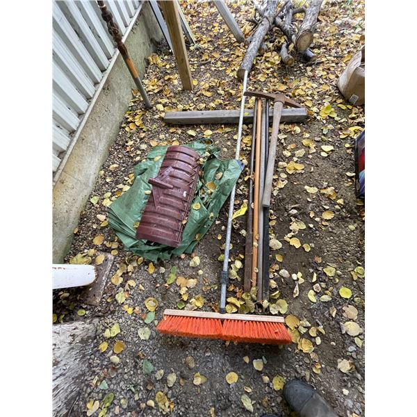 Pick axe, broom, tarp, prybars, shovel head