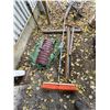Image 1 : Pick axe, broom, tarp, prybars, shovel head