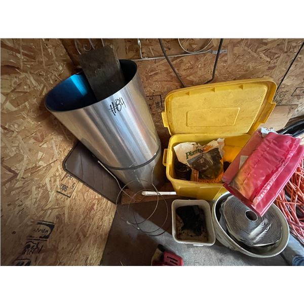 Fuel hose, tin roll, tote, pail of rubber seals