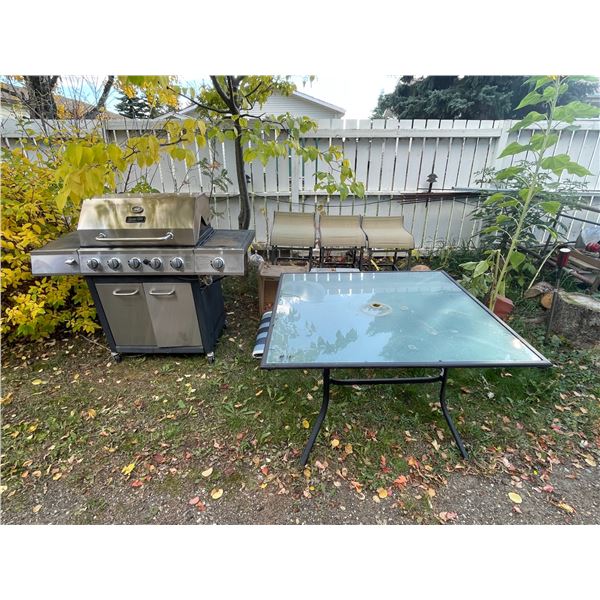 3 Stools, cooler, shelf, patio carpet, glass table, BBQ
