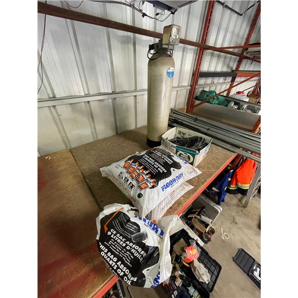 Bags of floor dry, oxygen tank, rope, paper roll