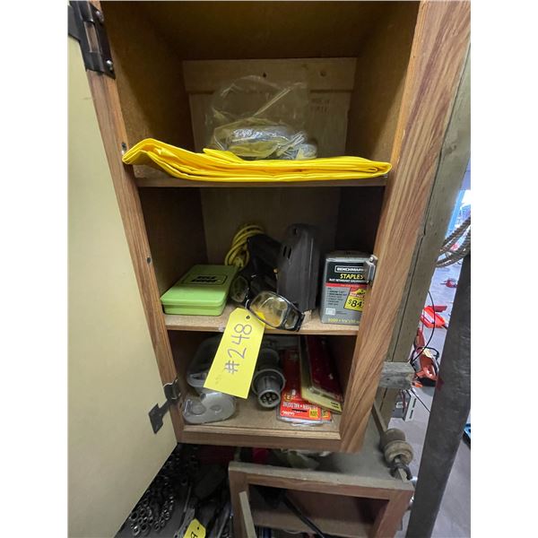 Contents of cabinets, bulbs, stapler, screws, tape measure