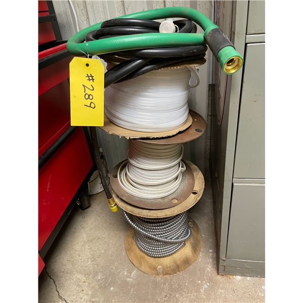 Roll of hose, 2 rolls of cable, garden hose