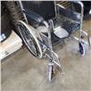 Image 3 : FOLDING WHEELCHAIR WITH FOOT HOLDS