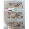 Image 2 : 3 MINT CONDITION 1986 2.00 CANADIAN BILLS IN SEQUENCE LAST YEAR