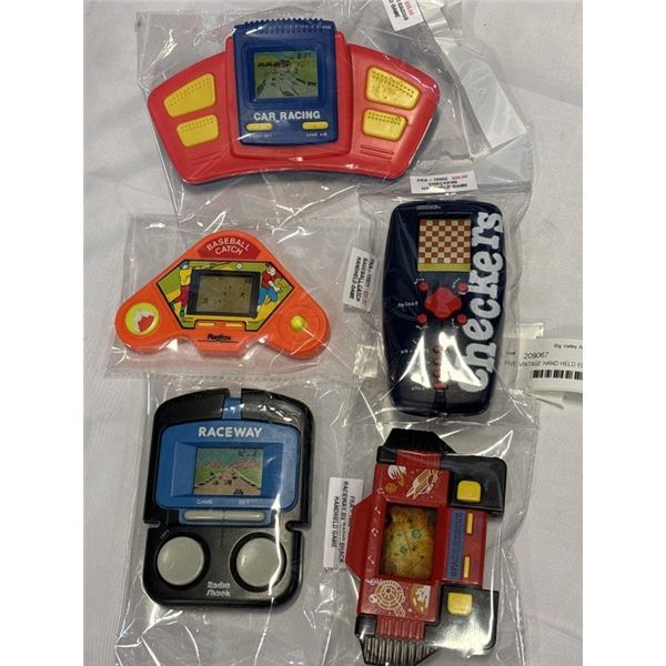 FIVE VINTAGE HAND HELD ELECTRONIC GAMES