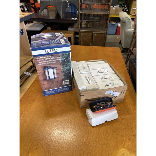 BOX OF EYEGLASS CASES AND EXTERIOR LIGHT FIXTURE