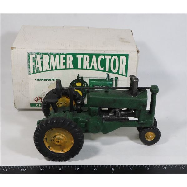 VINTAGE CAST IRON TRACTOR FIGURE IN BOX
