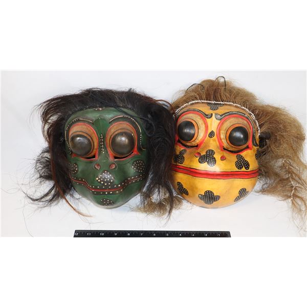 PAIR OF WEST AFRICAN CARVED WOOD MASK