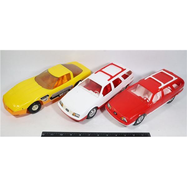 THREE VINTAGE PLASTIC TOY CARS, ONE IS BY ERTL