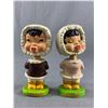 Image 1 : 2 Cute Vintage "Kiss Me" Magnetic Kissing Eskimo Bobble-Head Dolls.  Boy has crack in hood, still di