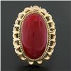 Image 2 : Vintage 18k Gold GIA Oval Cabochon Orange-Red Coral w/ Open Work Frame Ring