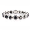 Image 1 : 22.12 ctw Fancy Black Diamond and 3.20 ctw Diamond 14K White Gold Bracelet