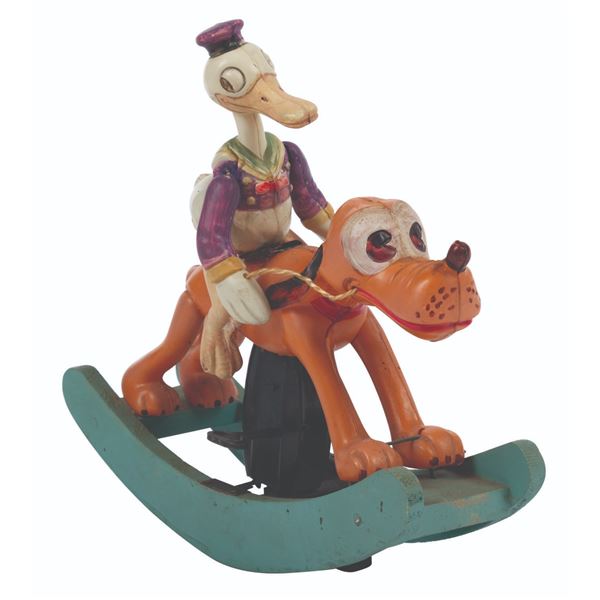 A Rare Donald Duck on Pluto Celluloid Toy.