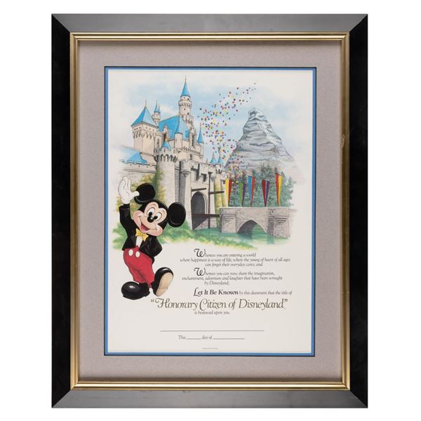 A Disneyland Honorary Citizen Certificate with Mickey.
