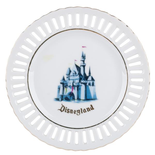 A Sleeping Beauty Castle Souvenir Lace Plate.