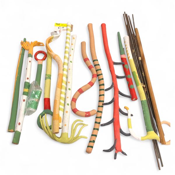 from "Embellished Landscape: assorted forearm-length plants with metal rods" 1985 w/Ceramic, oil  (B