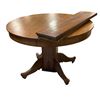 Image 1 : Wooden round dining room table w/ leaf extension - 45x30"