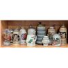 Image 1 : Group of 9 assorted beer steins & beer glass - includes German Lederhosen lidded stein etc
