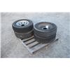 Image 1 : set of 4 used 225/75R15 trailer tires on 6 bolt rim