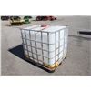 Image 3 : plastic tote in steel cage