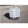 Image 2 : plastic tote in steel cage