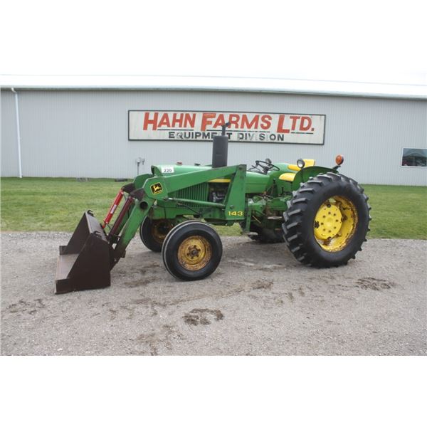 JD 1120 2wd tractor, 143 loader, showing 994 hours