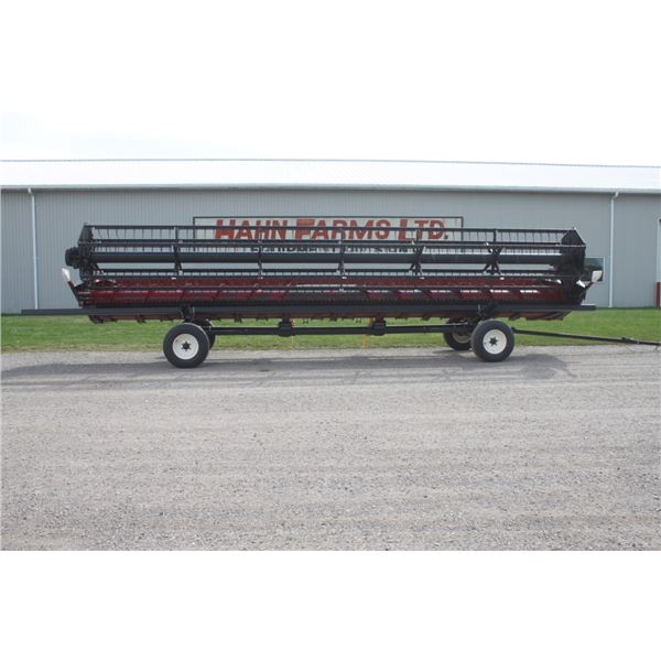 2006, CIH 1020 30' flex head, 3" knife, tracker, (Header Carrier Wagon is NOT INCLUDED)