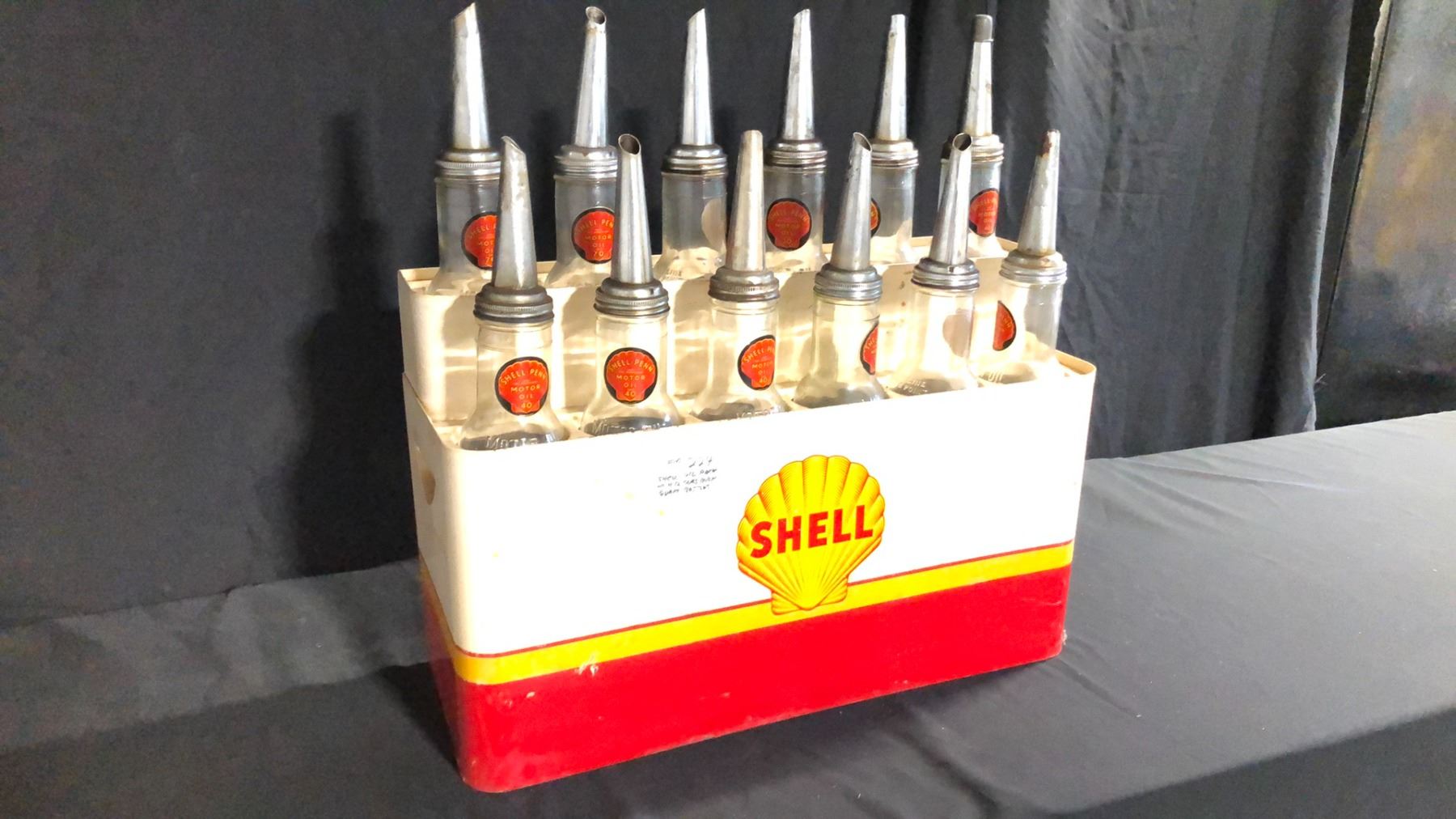 SHELL RACK INCLUDING QUART 12 MOTOR OIL BOTTLES SHELL-PENN CIRCA 1920'S ...