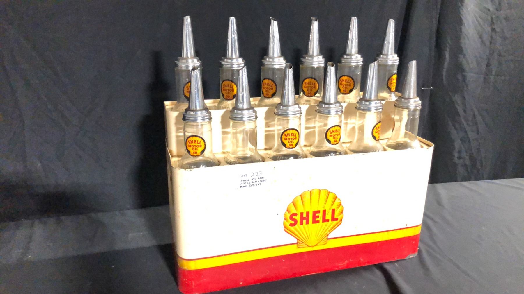 Shell Penn Rack SHELL RACK INCLUDING QUART 12 MOTOR OIL BOTTLES SHELL-PENN CIRCA 1920'S ...
