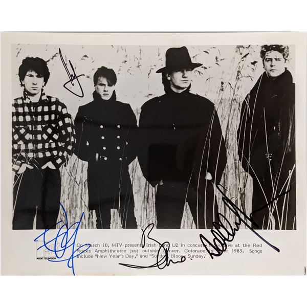 U2 signed photo