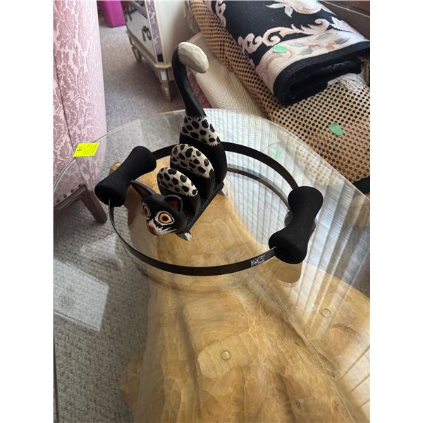 Pilates exercise item, and cat decor