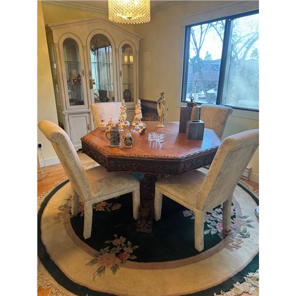 Stunning carved wood table with four chairs 52 inches