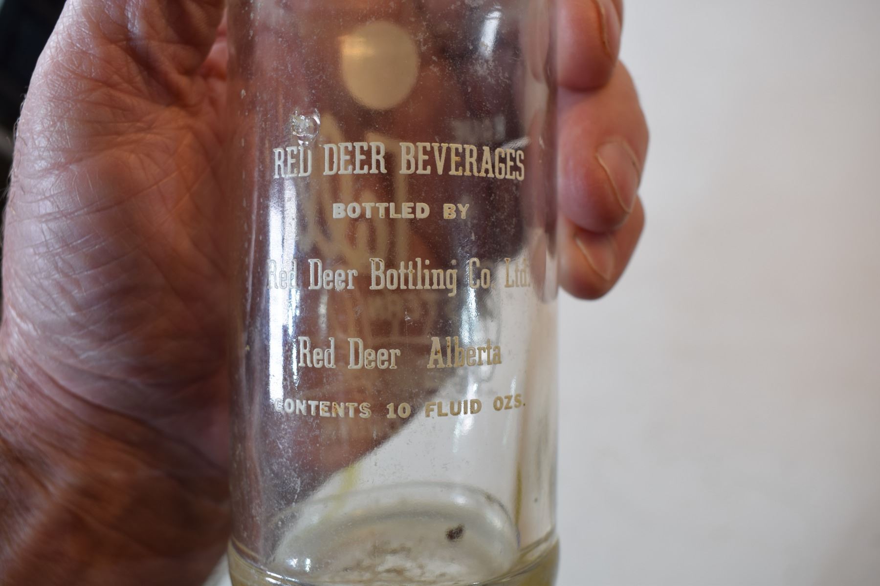 Tall Western drink Red Deer bottle Schmalz Auctions