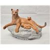 Image 1 : Ceramic Lioness with Cubs on Rock