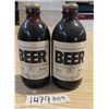 Image 1 : Pair of vintage full beer bottles