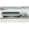 Image 1 : Kenworth grain hauler, semi truck and trailer - 17.5" white cab