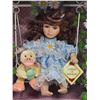 Image 2 : Classic Treasures, porcelain doll on swing - in box